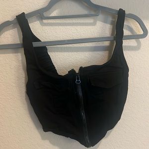 A cropped vest/shirt good condition